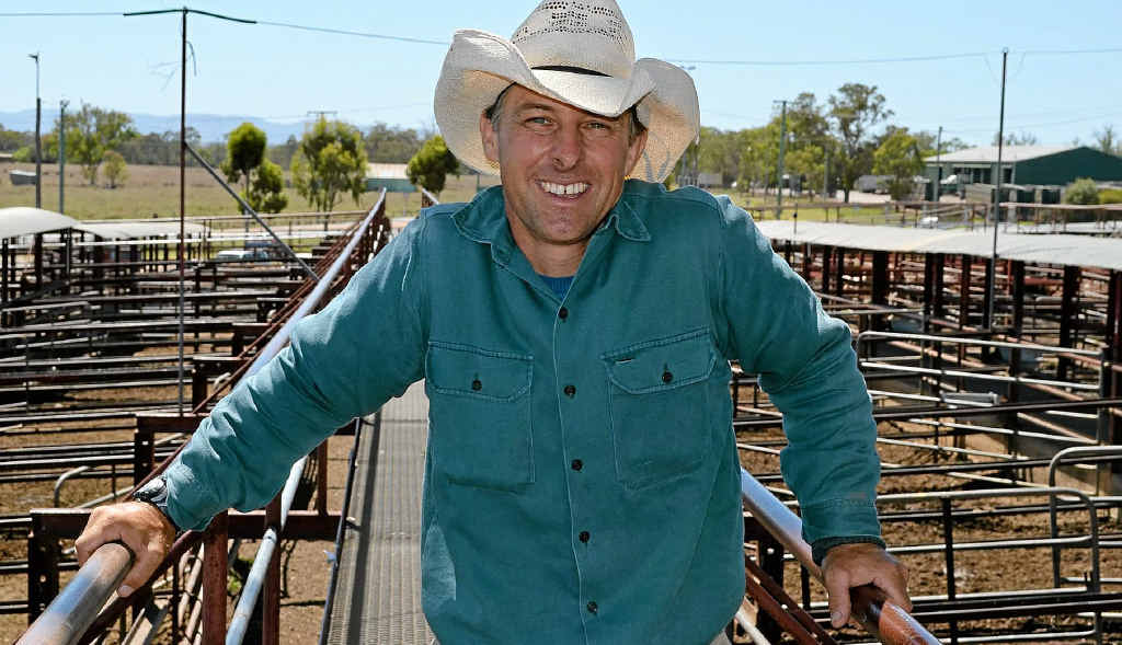 THE RUNNER: Jonathan Schlacher has been criss-crossing the catwalks at Warwick saleyards for 20 years. THE RUNNER: Jonathan Schlacher has been criss-crossing the catwalks at Warwick saleyards for 20 years.
